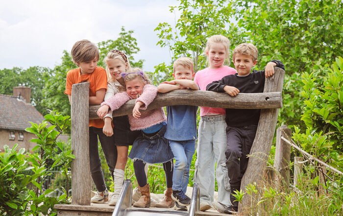 Kinderen aan het spelen bij de bso van kinderopvang huizen